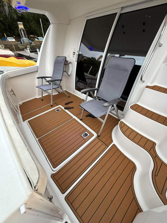 Customer-installed EVA flooring in the deck area of a 2001 Silverton 410 Sportbridge